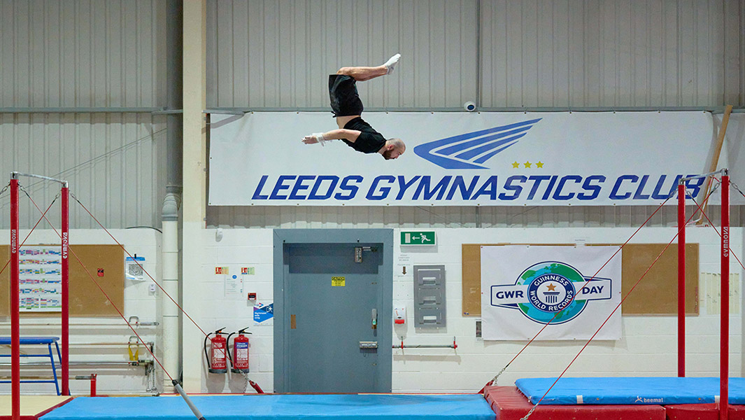 Gymnast Ash Watson does epic flying backflip to break record