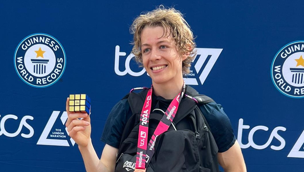 George solved a record-breaking number of Rubik's cubes while running a MARATHON