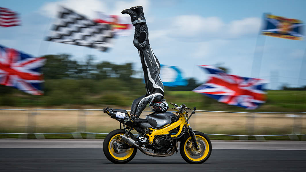 Stunt rider breaks record for doing a handstand on a moving motorbike!