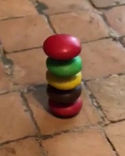 He can stack five M&Ms on top of each other! | Guinness World Records