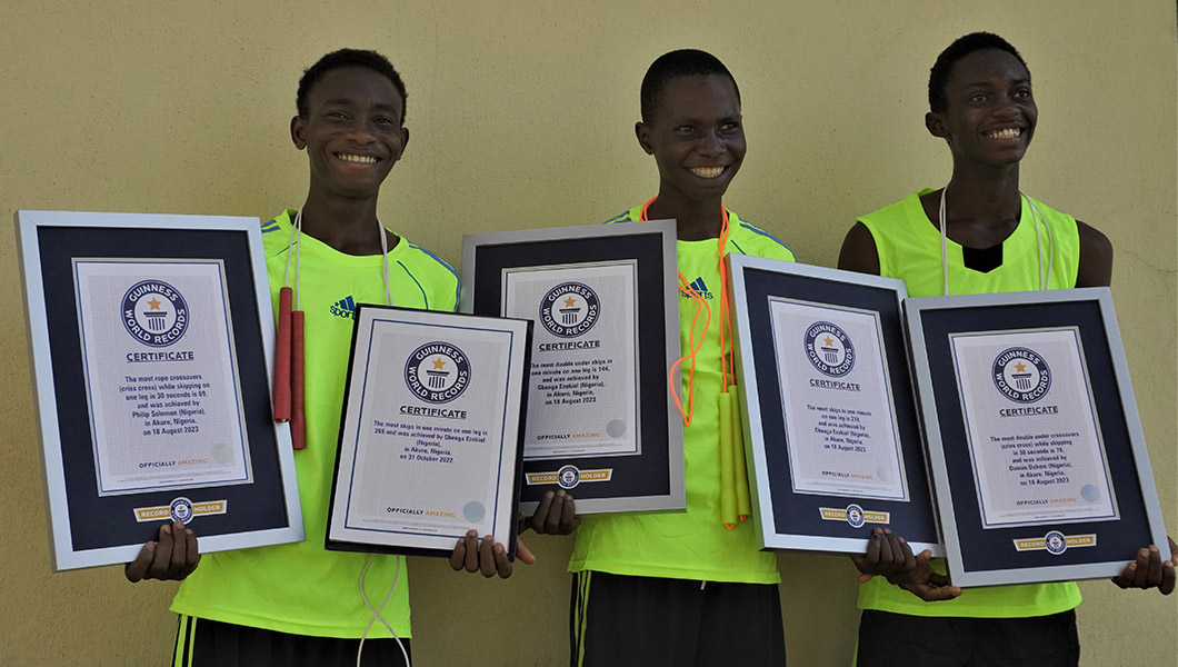 Record holders smiling for thumbnail