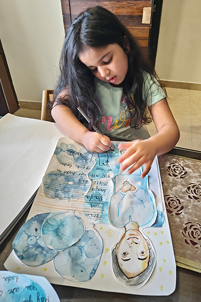 Anvi working on an art project