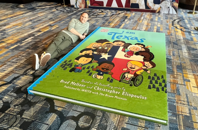 largest book next to person for scale