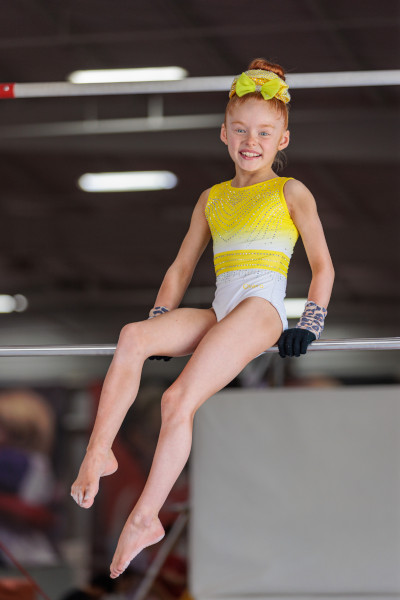Kynlee sitting on bar