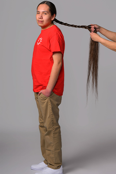 Reuben hair being braided