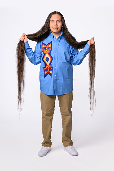 Reuben holding hair in two bunches