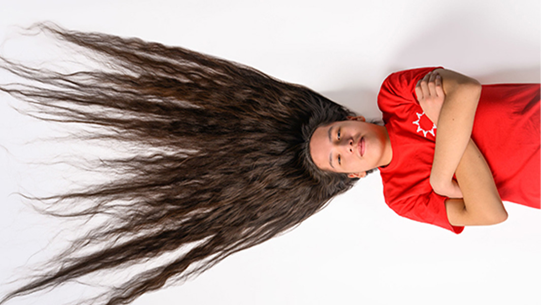 Reuben split header showing hair