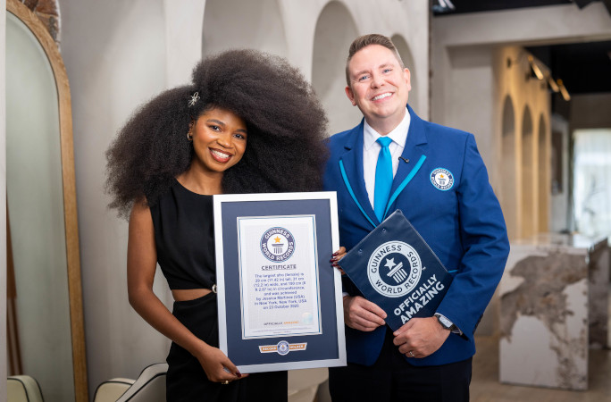 Jess with Adjudicator holding certificate