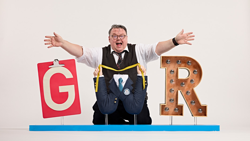 Craig behind GWR sign with open arms