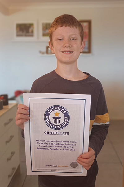 Lachlan holding his official GWR certificate
