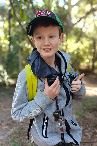 Lachlan walking in the woods