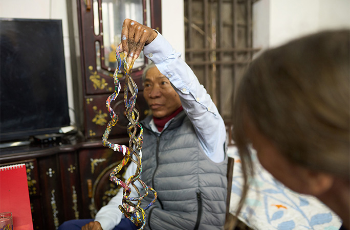 man showing longest fingernails