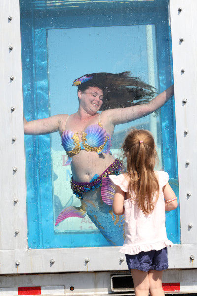 Little girl with mermaid