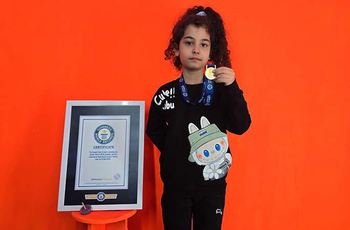 Hana with her GWR certificate and medal