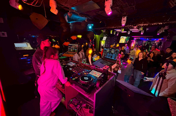 Illumi performing at club