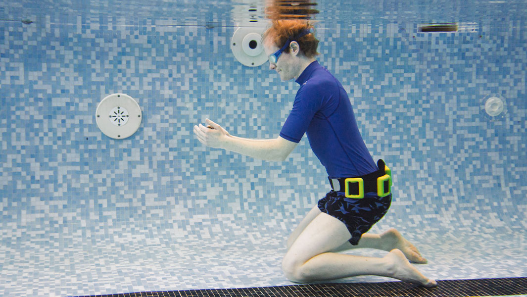 split image professor with football teacher underwater