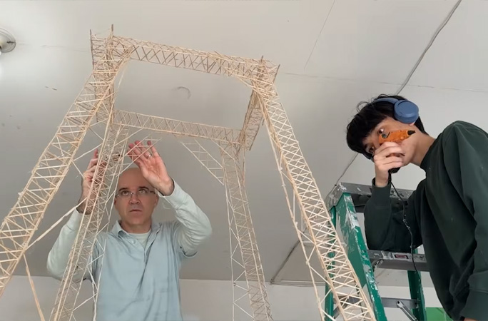 Eric with dad building