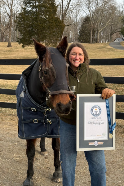 Paige and Fancy posing with certificate