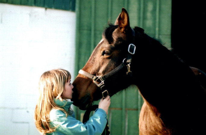 Paige as kid kissing Fancy