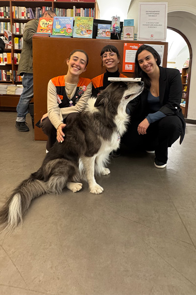 Leonard with bookshop employees