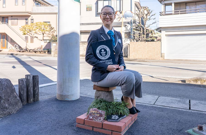 Adjudicator sitting on smallest park