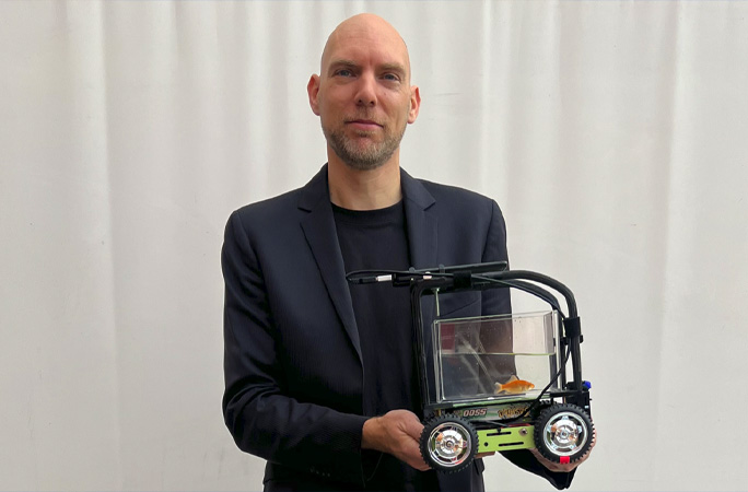 Thomas holding Blub in car