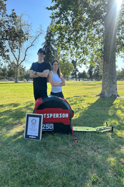 record breakers with measure tape