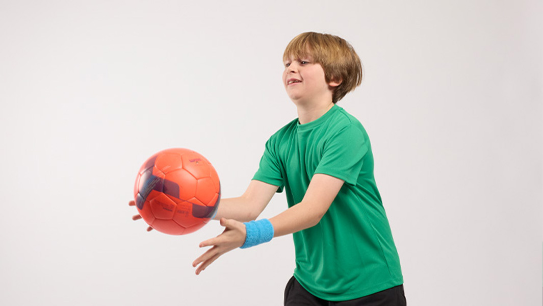 Split image boy doing cartwheel boy catching ball