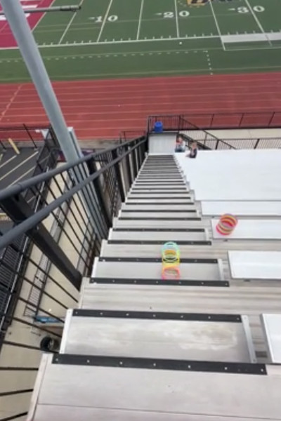 slinky descending towards field