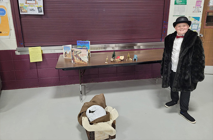 Anderson posing with miniatures