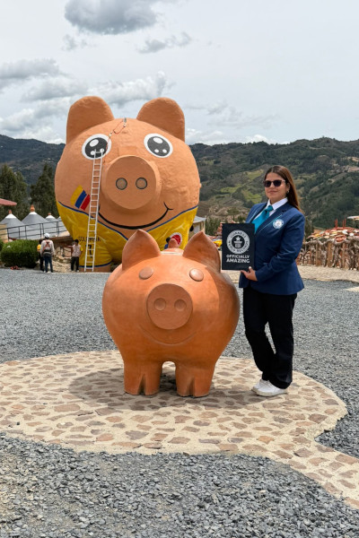 adjudicator with piggy bank