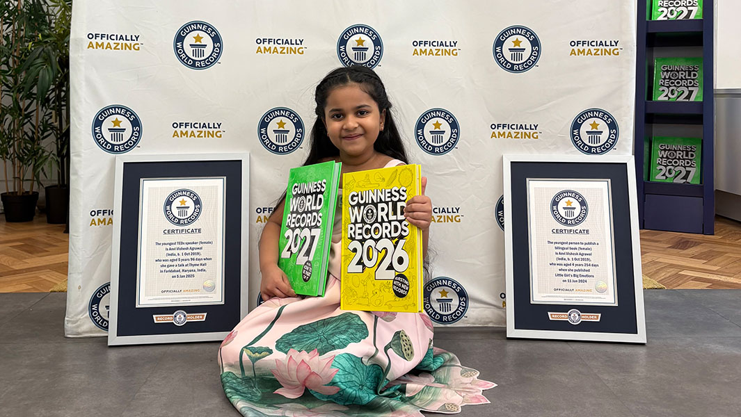 Images of Anvi with GWR Editor Caitlin Hyem, a cardboard cutout of Jyoti Amge and her mum 