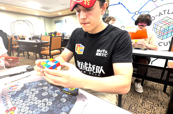 tommy studying cube