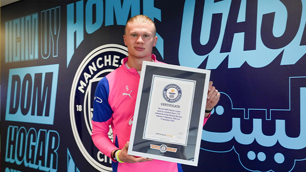 Erling showing and looking at record certificate