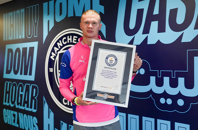 Erling showing certificate