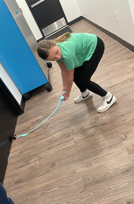 Madison stretches slime from wall