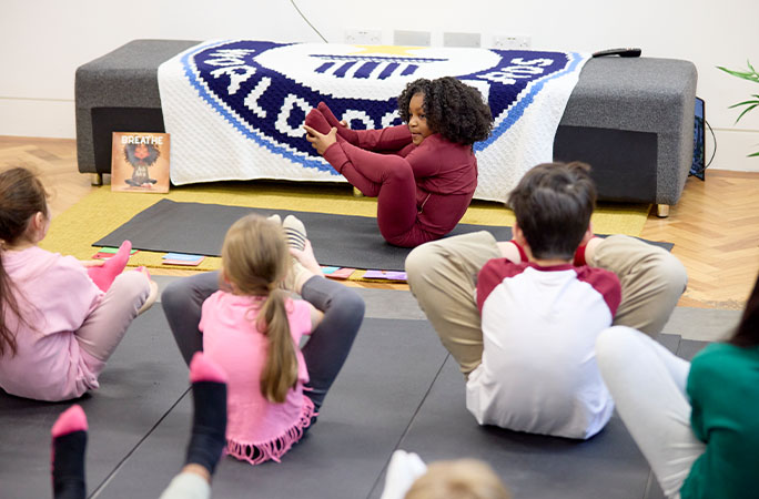 phoenix teaching yoga to kids