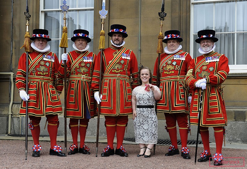 Ellie receiving an OBE