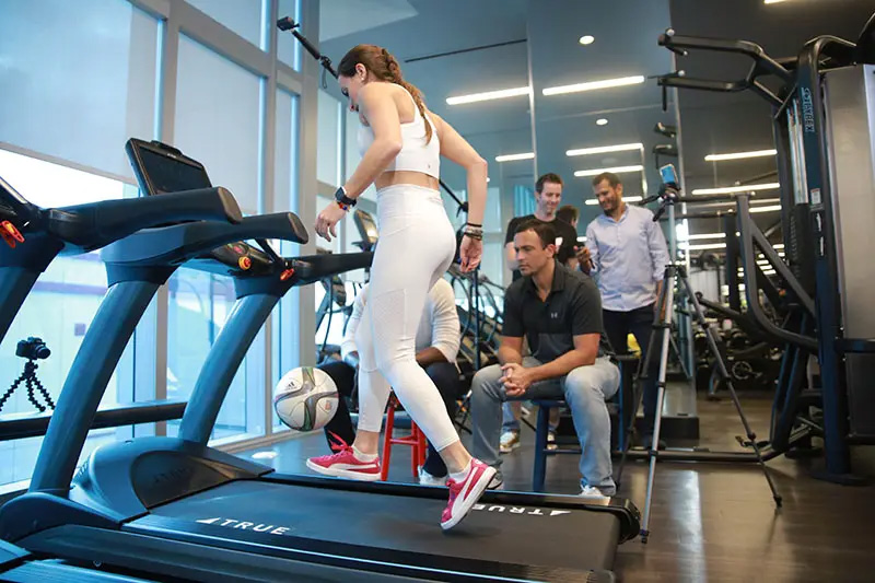 Laura keeping the ball up on a treadmill