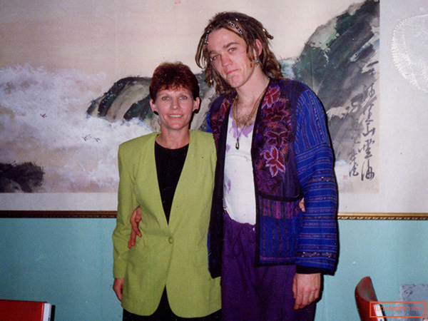 Lucky with his mum before the tattoos