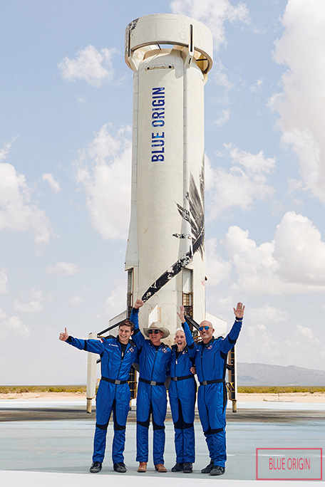 Wally waving with blue origin group