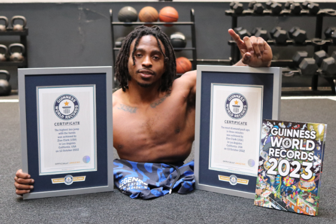 Zion clark holding up GWR certificates