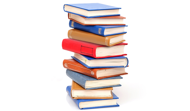 books stacked on top of each other