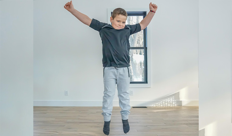 Boy doing jumping jack
