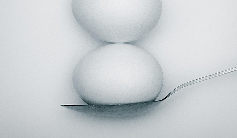 Spoon with two eggs