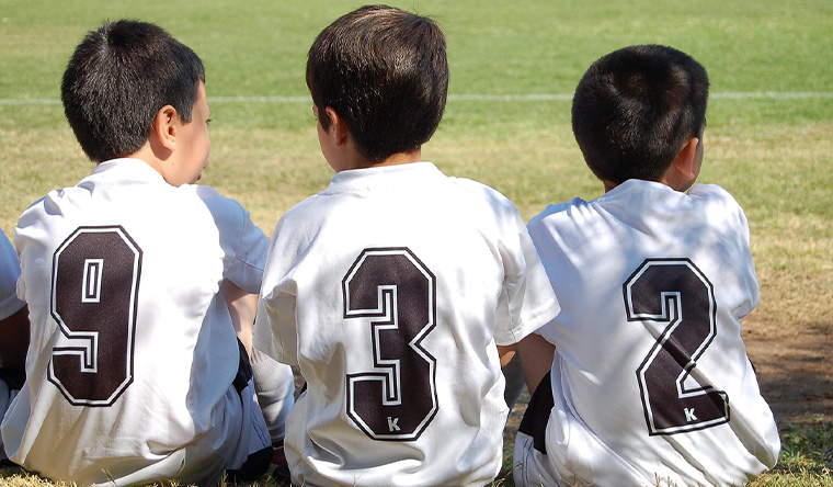 Three boys sitting