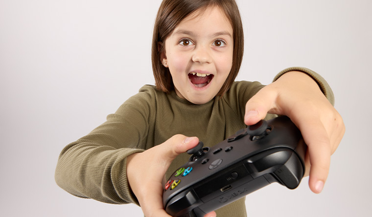 girl playing videogame
