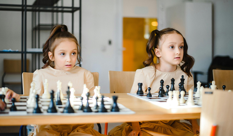 Girls playing chess