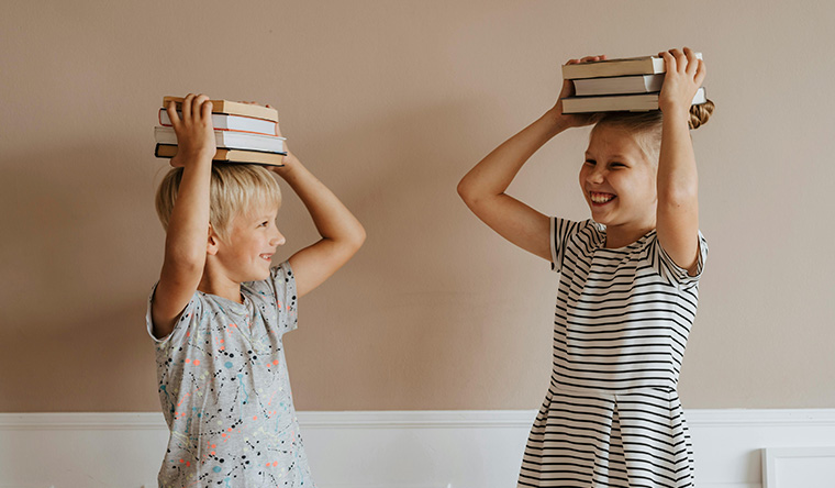 girls with books in heads
