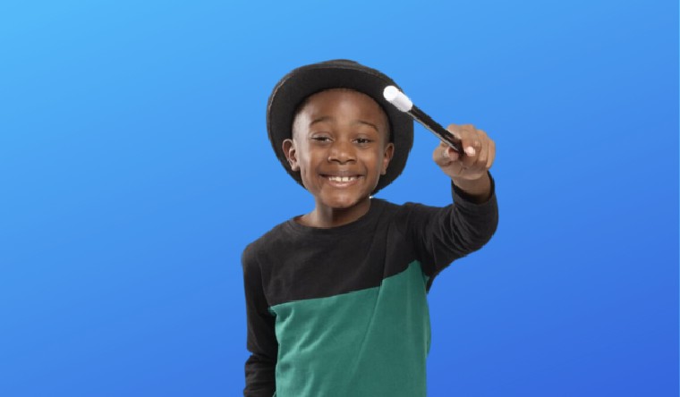 Kid with hat holding magic wand